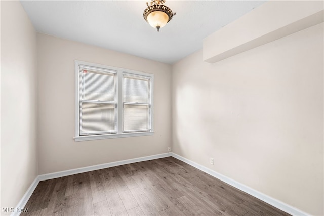 907 Hillsdale Ave, Parma, OH 44134 - unfurnished room featuring wood finished floors and baseboards