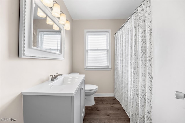 907 Hillsdale Ave, Parma, OH 44134 - full bath featuring vanity and wood finished floors