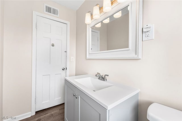 907 Hillsdale Ave, Parma, OH 44134 - bathroom featuring vanity and wood finished floors