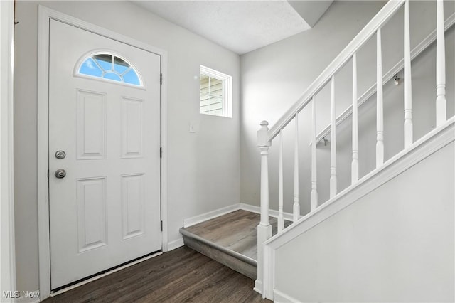3990 Abigail Dr, Lorain, OH 44053 - entrance foyer featuring wood finished floors and stairs