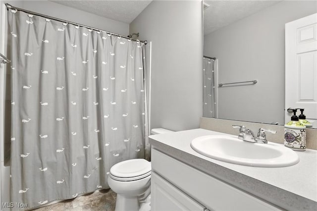 3990 Abigail Dr, Lorain, OH 44053 - full bathroom featuring a textured ceiling, vanity, and curtained shower