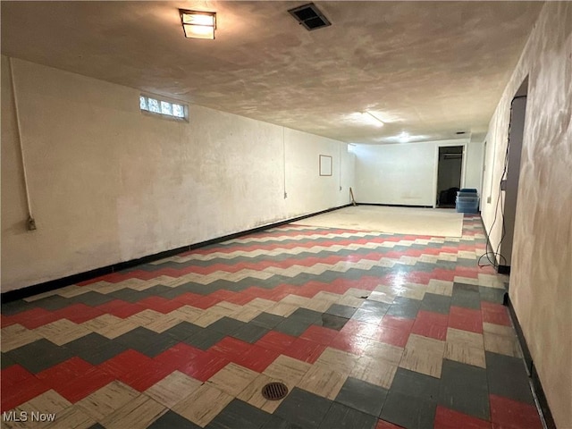 344 17th St NW, Barberton, OH 44203 - basement with tile patterned floors and baseboards