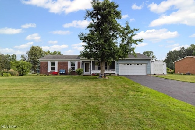 1114 Beechwood Rd, Salem, OH 44460 - view of front facade featuring an attached garage, driveway, a front lawn, and a porch