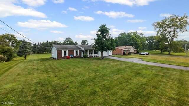 1114 Beechwood Rd, Salem, OH 44460 - single story home with asphalt driveway, a front lawn, and an attached garage