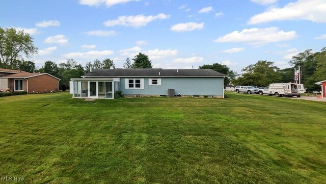 1114 Beechwood Rd, Salem, OH 44460 - rear view of property featuring a sunroom and a yard