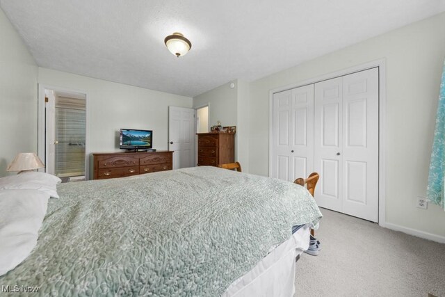 1114 Beechwood Rd, Salem, OH 44460 - carpeted bedroom featuring a closet and baseboards