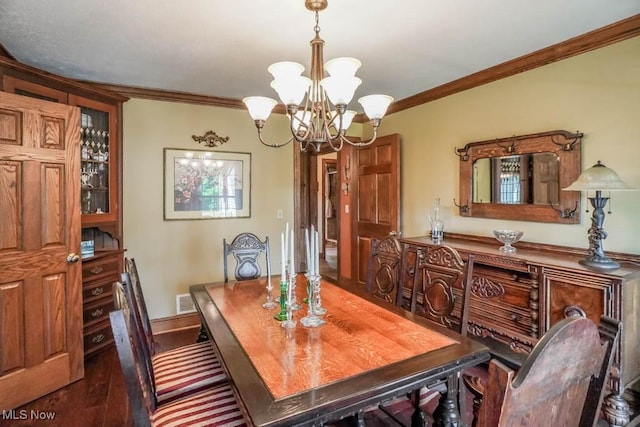 3020 Crookston Ln, Clinton, OH 44216 - dining area featuring a chandelier, ornamental molding, and wood finished floors