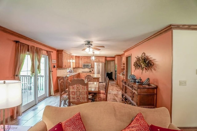 3020 Crookston Ln, Clinton, OH 44216 - dining room featuring ceiling fan and ornamental molding