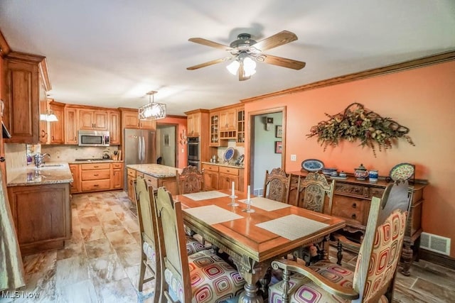 3020 Crookston Ln, Clinton, OH 44216 - dining room featuring ceiling fan and ornamental molding