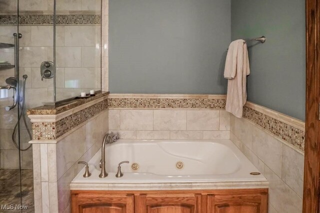 3020 Crookston Ln, Clinton, OH 44216 - bathroom with a shower stall and a jetted tub
