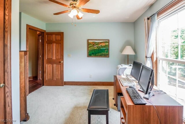 3020 Crookston Ln, Clinton, OH 44216 - carpeted home office featuring a ceiling fan and baseboards