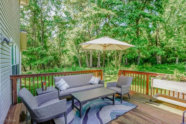 3020 Crookston Ln, Clinton, OH 44216 - wooden deck with outdoor lounge area and view of wooded area