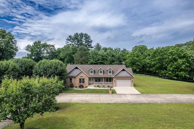 116 Falling Waters Dr, Vienna, WV 26105 - view of front of property featuring brick siding, concrete driveway, and an attached garage