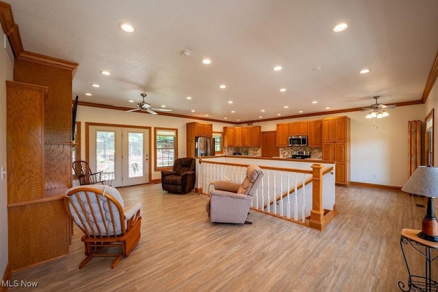 116 Falling Waters Dr, Vienna, WV 26105 - living room with ceiling fan, crown molding, recessed lighting, and light wood-type flooring