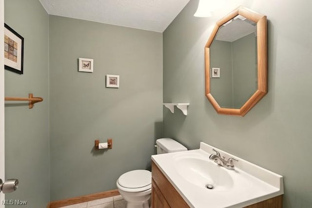 1367 Hidden Lake Blvd, Akron, OH 44312 - half bathroom featuring vanity and tile patterned flooring