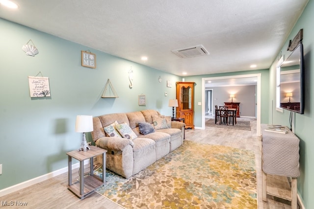 1260 Pleasant Ridge St SE, Minerva, OH 44657 - living area featuring wood finished floors and recessed lighting