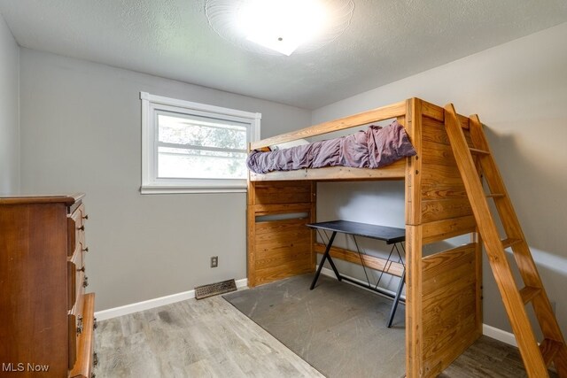 1260 Pleasant Ridge St SE, Minerva, OH 44657 - bedroom with wood finished floors and baseboards