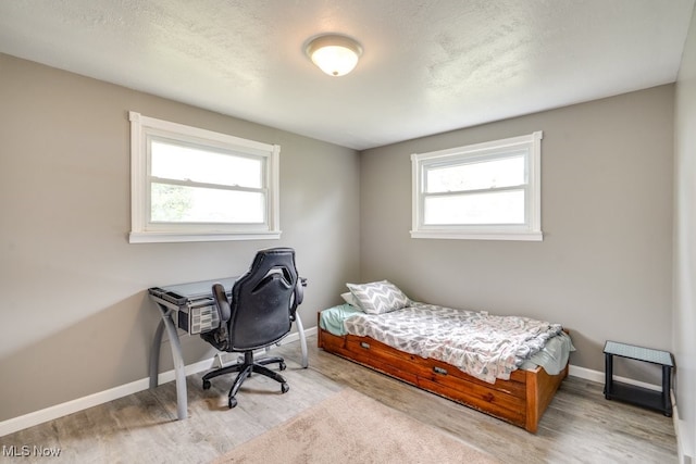 1260 Pleasant Ridge St SE, Minerva, OH 44657 - bedroom with wood finished floors