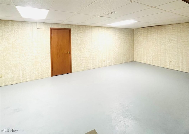 1260 Pleasant Ridge St SE, Minerva, OH 44657 - finished below grade area with a paneled ceiling and wallpapered walls