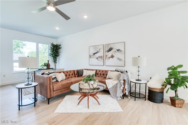 1369 W 74th St, Cleveland, OH 44102 - living room with light wood-style floors, a ceiling fan, and recessed lighting
