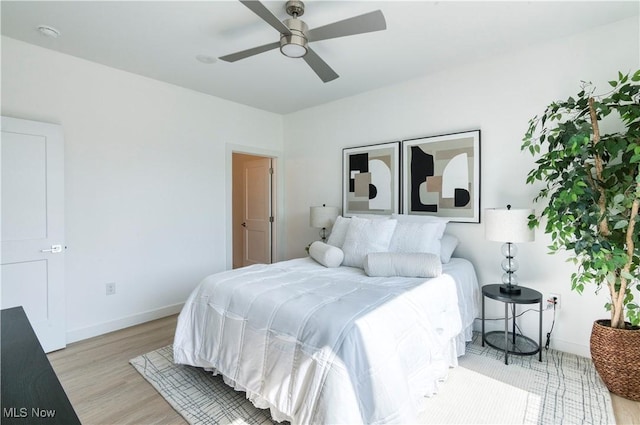 1369 W 74th St, Cleveland, OH 44102 - bedroom featuring light wood finished floors and a ceiling fan