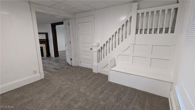 916 6th St NW, Canton, OH 44703 - staircase with carpet floors and baseboards