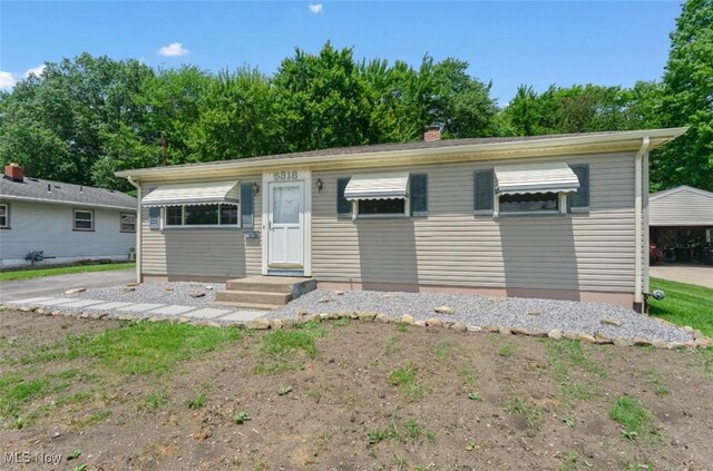 5318 Pinecrest Ave, Youngstown, OH 44515 - view of front of home featuring a chimney