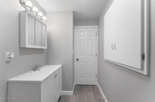 5318 Pinecrest Ave, Youngstown, OH 44515 - bathroom featuring vanity and wood finished floors