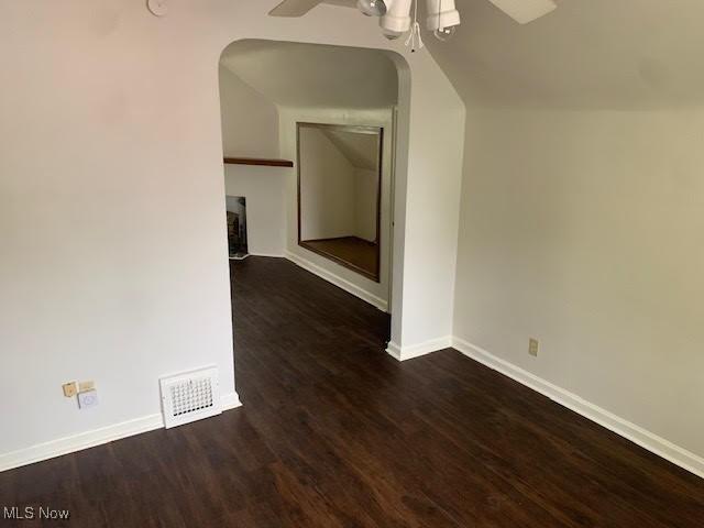 1543 Genesee Rd, South Euclid, OH 44121 - spare room with a ceiling fan, arched walkways, wood finished floors, and lofted ceiling