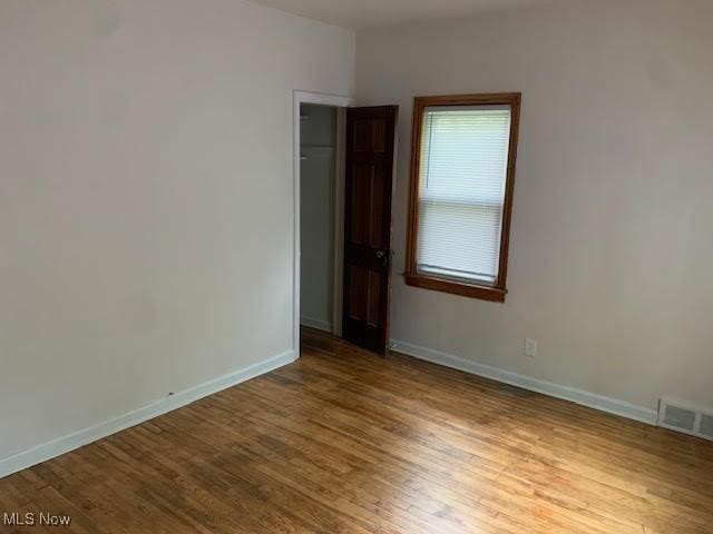 1543 Genesee Rd, South Euclid, OH 44121 - empty room featuring wood finished floors and baseboards