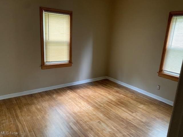 1543 Genesee Rd, South Euclid, OH 44121 - spare room with light wood-type flooring and baseboards