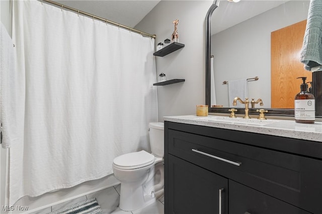 7287 Fayette Blvd, Chippewa Lake, OH 44215 - full bathroom featuring vanity, shower / bath combo with shower curtain, and tile patterned floors