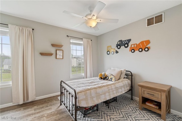 7287 Fayette Blvd, Chippewa Lake, OH 44215 - bedroom featuring wood finished floors and a ceiling fan