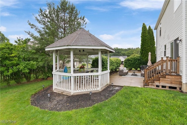 7287 Fayette Blvd, Chippewa Lake, OH 44215 - view of green lawn with a gazebo and a patio