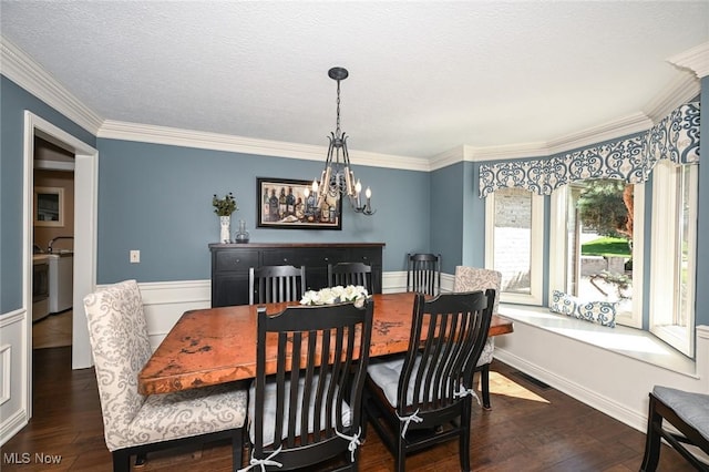 5277 Foxchase Ave NW, Canton, OH 44718 - dining space featuring ornamental molding, wood finished floors, a chandelier, and a textured ceiling