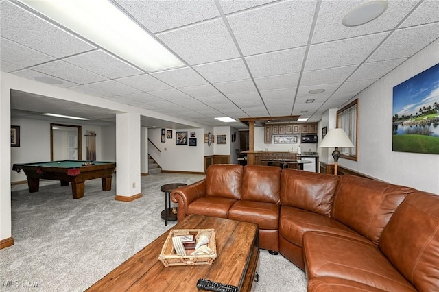 5277 Foxchase Ave NW, Canton, OH 44718 - carpeted living room with wet bar, billiards table, stairs, and a paneled ceiling