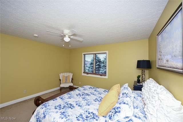5277 Foxchase Ave NW, Canton, OH 44718 - bedroom featuring carpet, a textured ceiling, and ceiling fan