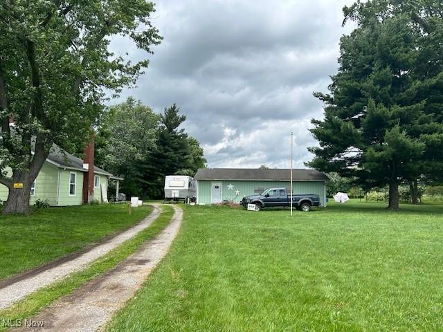17880 State Route 62, Beloit, OH 44609 - view of green lawn featuring dirt driveway
