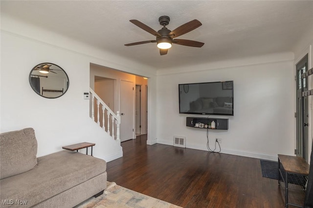29123 Homewood Dr, Wickliffe, OH 44092 - living area with stairs, wood finished floors, and a ceiling fan