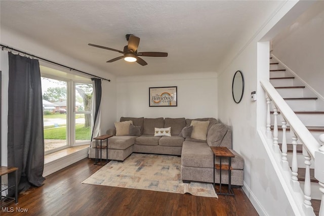 29123 Homewood Dr, Wickliffe, OH 44092 - living area featuring a ceiling fan, wood finished floors, and stairs