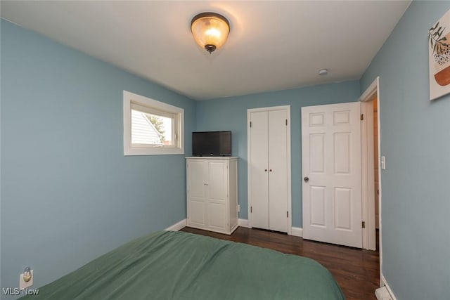 29123 Homewood Dr, Wickliffe, OH 44092 - bedroom with dark wood-style flooring and baseboards