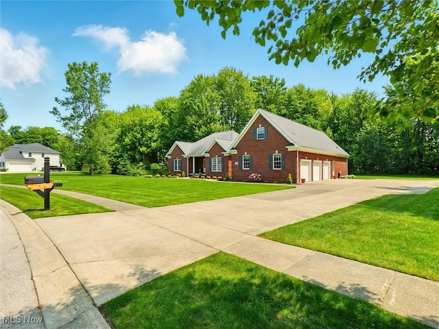 4440 Rutledge Ave, Ashtabula, OH 44004 - view of front facade with a front lawn, brick siding, and a garage