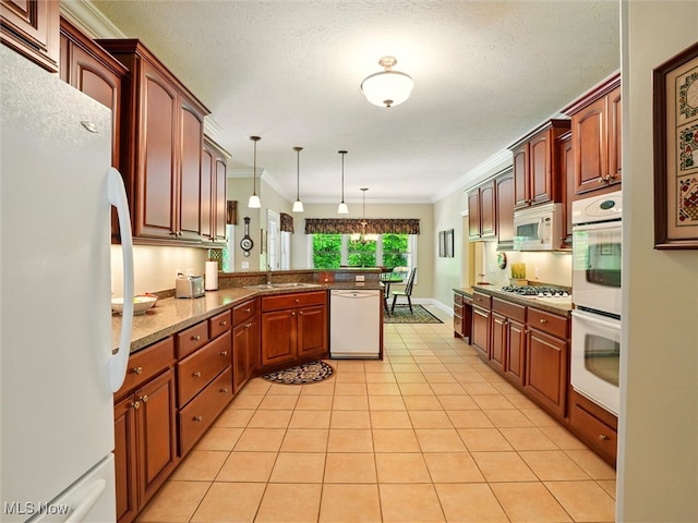 4440 Rutledge Ave, Ashtabula, OH 44004 - kitchen featuring white appliances, a peninsula, ornamental molding, decorative light fixtures, and light tile patterned floors