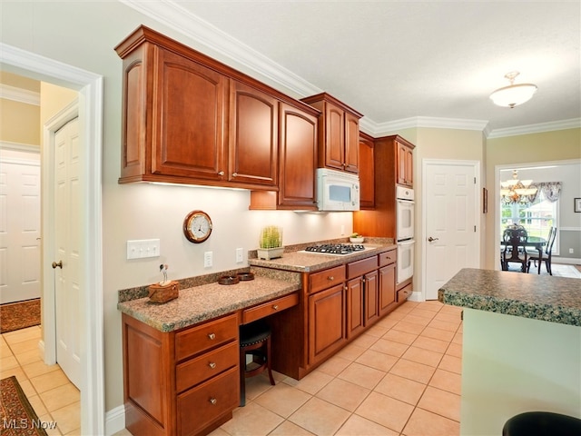 4440 Rutledge Ave, Ashtabula, OH 44004 - kitchen with white appliances, light tile patterned floors, built in study area, and ornamental molding
