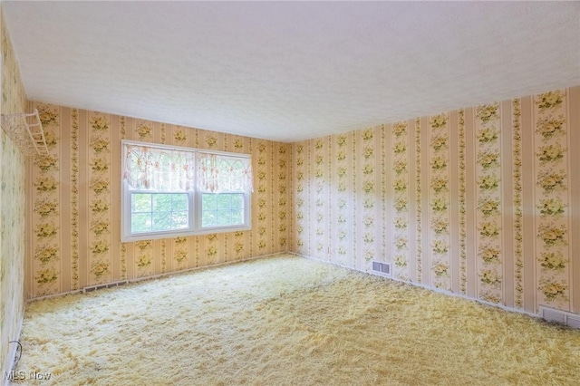 34112 Chagrin Blvd Unit 7106, Moreland Hills, OH 44022 - empty room featuring carpet and wallpapered walls