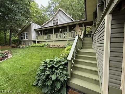 2461 Trailwood Dr SW, Carrollton, OH 44615 - rear view of property featuring a lawn and stairway