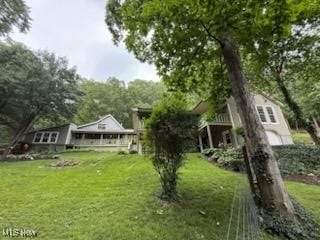 2461 Trailwood Dr SW, Carrollton, OH 44615 - view of green lawn