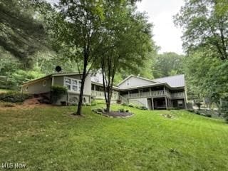 2461 Trailwood Dr SW, Carrollton, OH 44615 - back of property with a yard
