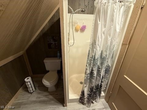 2461 Trailwood Dr SW, Carrollton, OH 44615 - bathroom with toilet and a shower with shower curtain