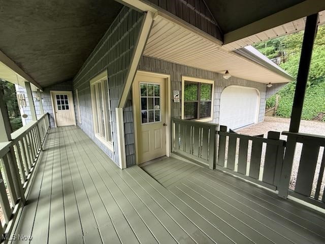 2461 Trailwood Dr SW, Carrollton, OH 44615 - porch featuring a garage